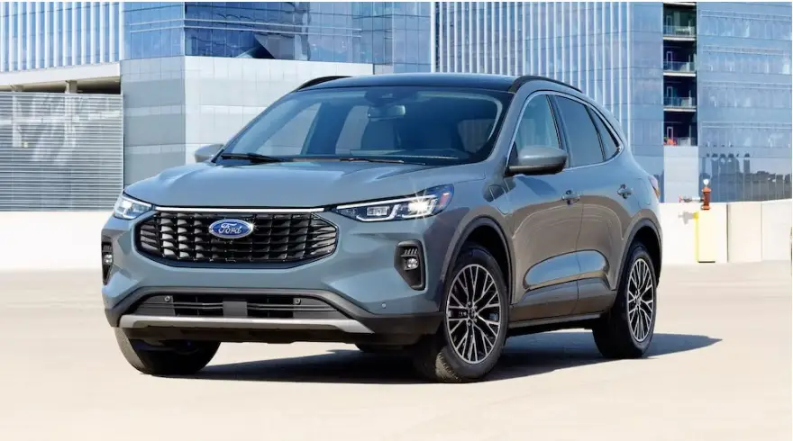 2025 Ford Escape Hybrid – A Balanced Blend of Power, Efficiency, and Practicality 2025 Ford Escape Hybrid driving on a suburban road, showcasing its aerodynamic design and fuel-efficient performance